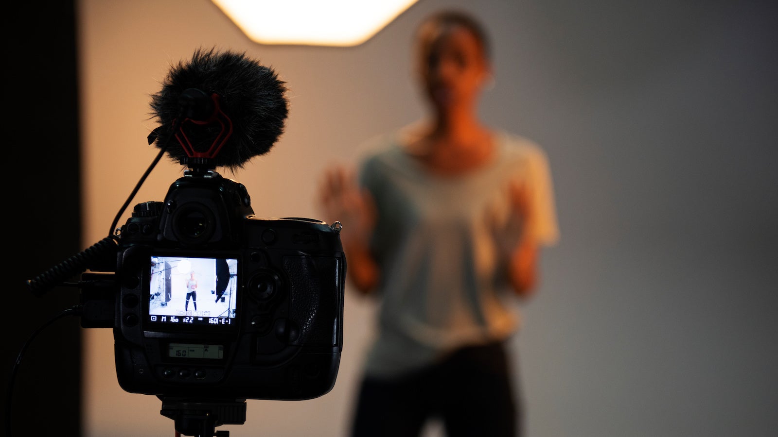 A girl in front of a camera