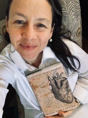 Erika Randall with a copy of "Music for Leaving"