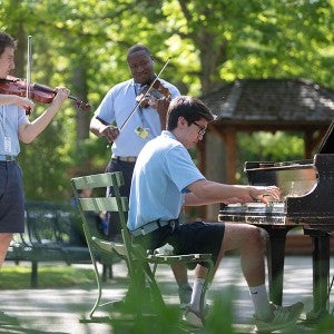Musicians perform on Osterlin Mall