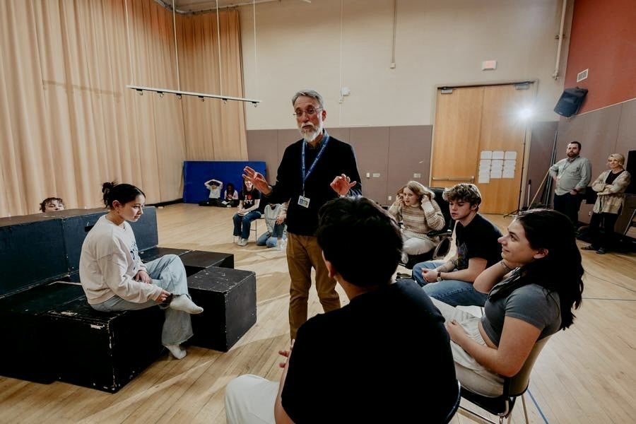Students listen attentively as Bill Church instructs.