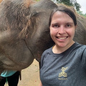 International Student Services Manager Kalyn Rabuse with an elephant