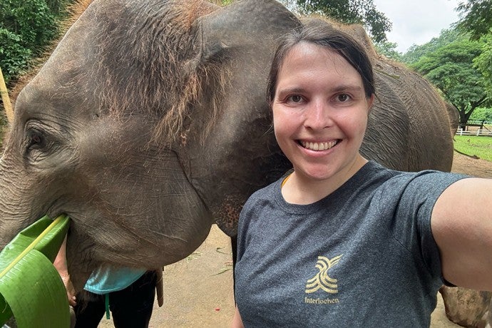 International Student Services Manager Kalyn Rabuse with an elephant