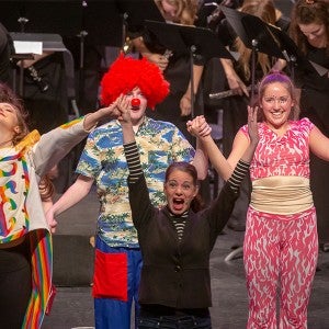 Kate Botello with theatre students after Kids Commute Live!