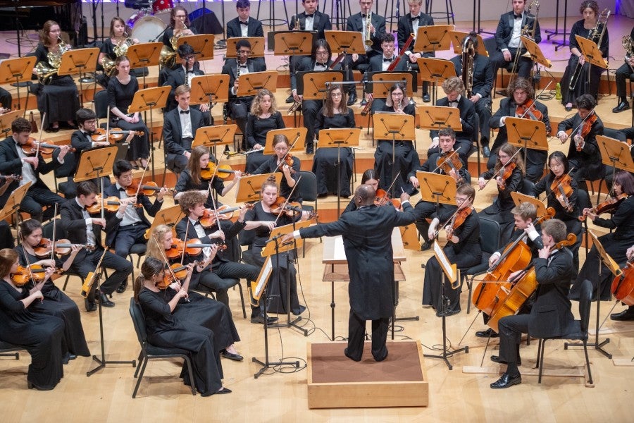 Dr. Leslie B. Dunner conducts the Arts Academy Orchestra in Miami