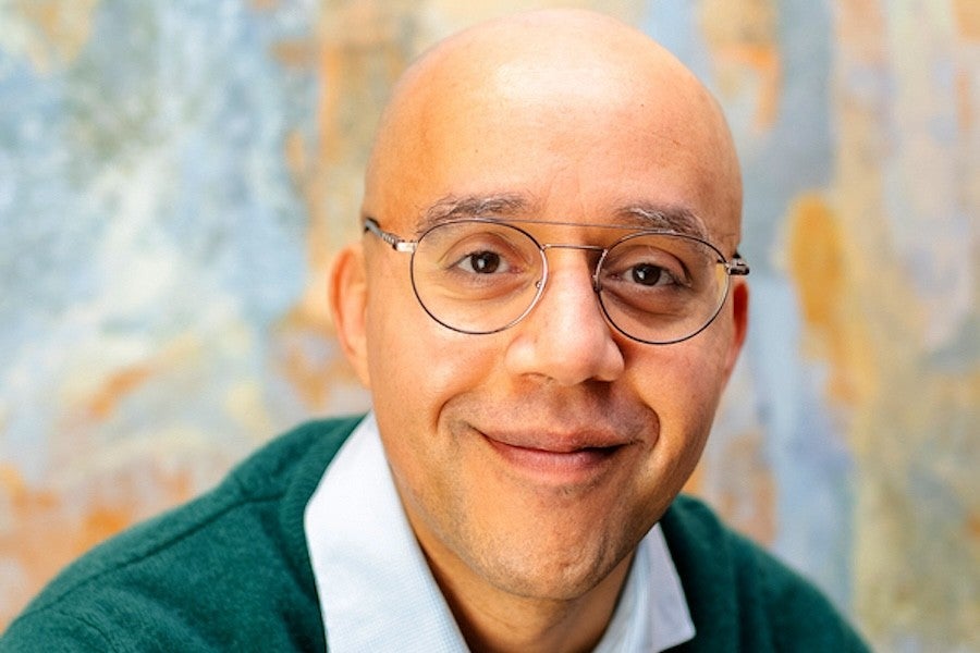 Headshot of Michael Romy Greer