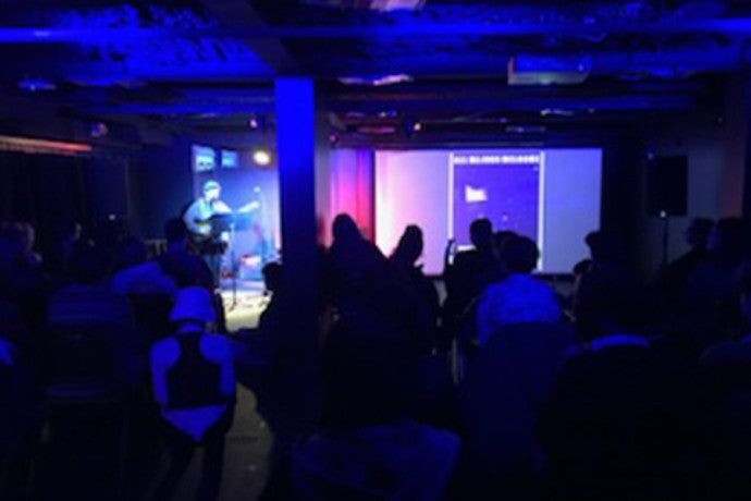 Audiences watch a recent Open Mic performance.