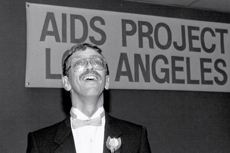 Pieters speaking at Elizabeth Taylor's September 1985 AIDS benefit.
