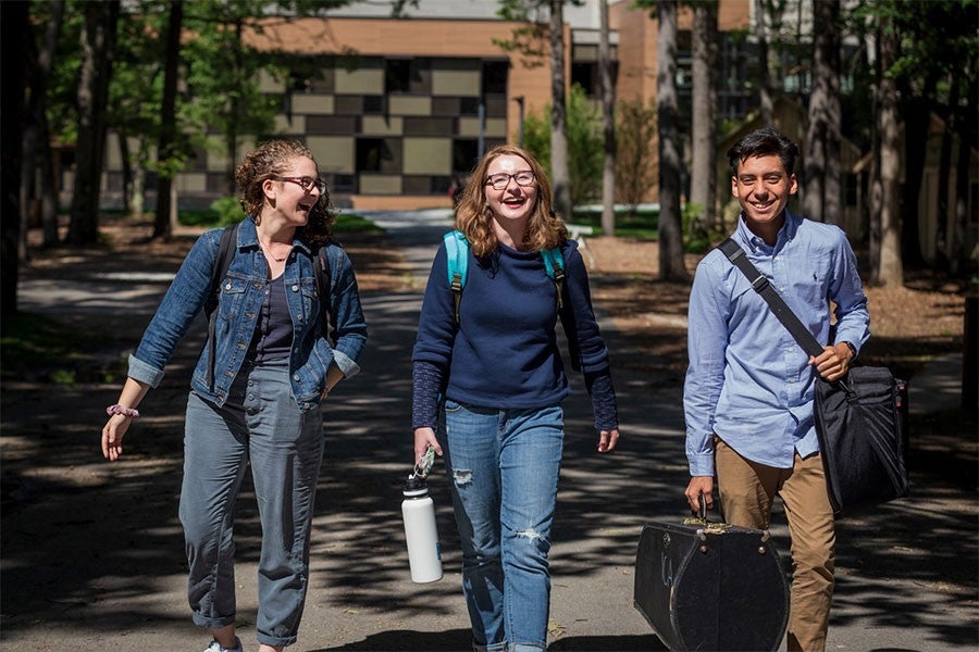 Three Interlochen Arts Academy students walk to their next class.
