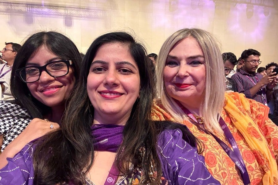 Briana Yarhouse (right) with fellow attendees at WAVES. 